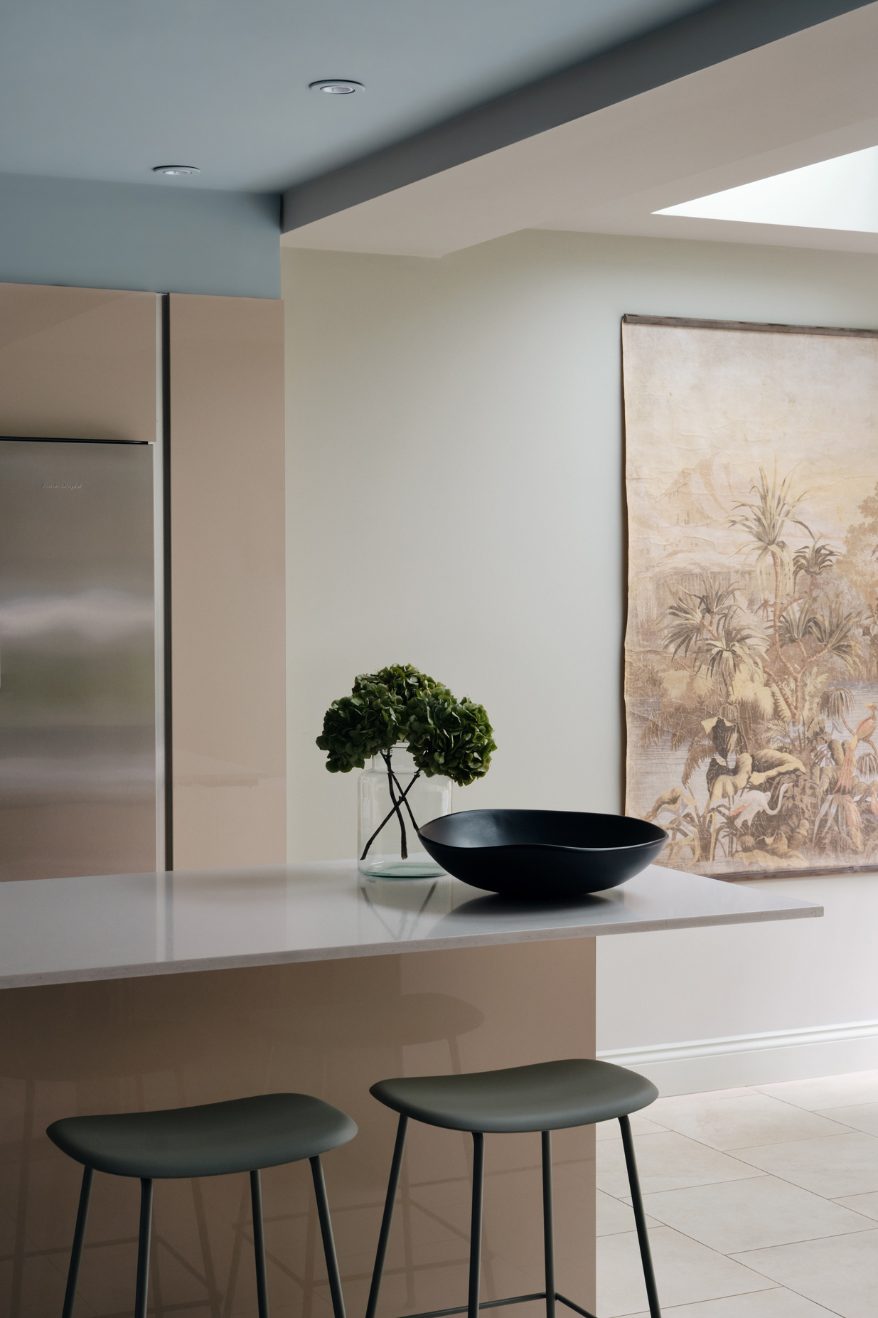 Hampstead Colours - kitchen breakfast bar with flowers and a painting of nature