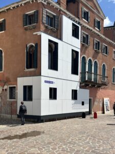 white insulated cladding panels installed on the exterior of a Venetian Palazzo. 
