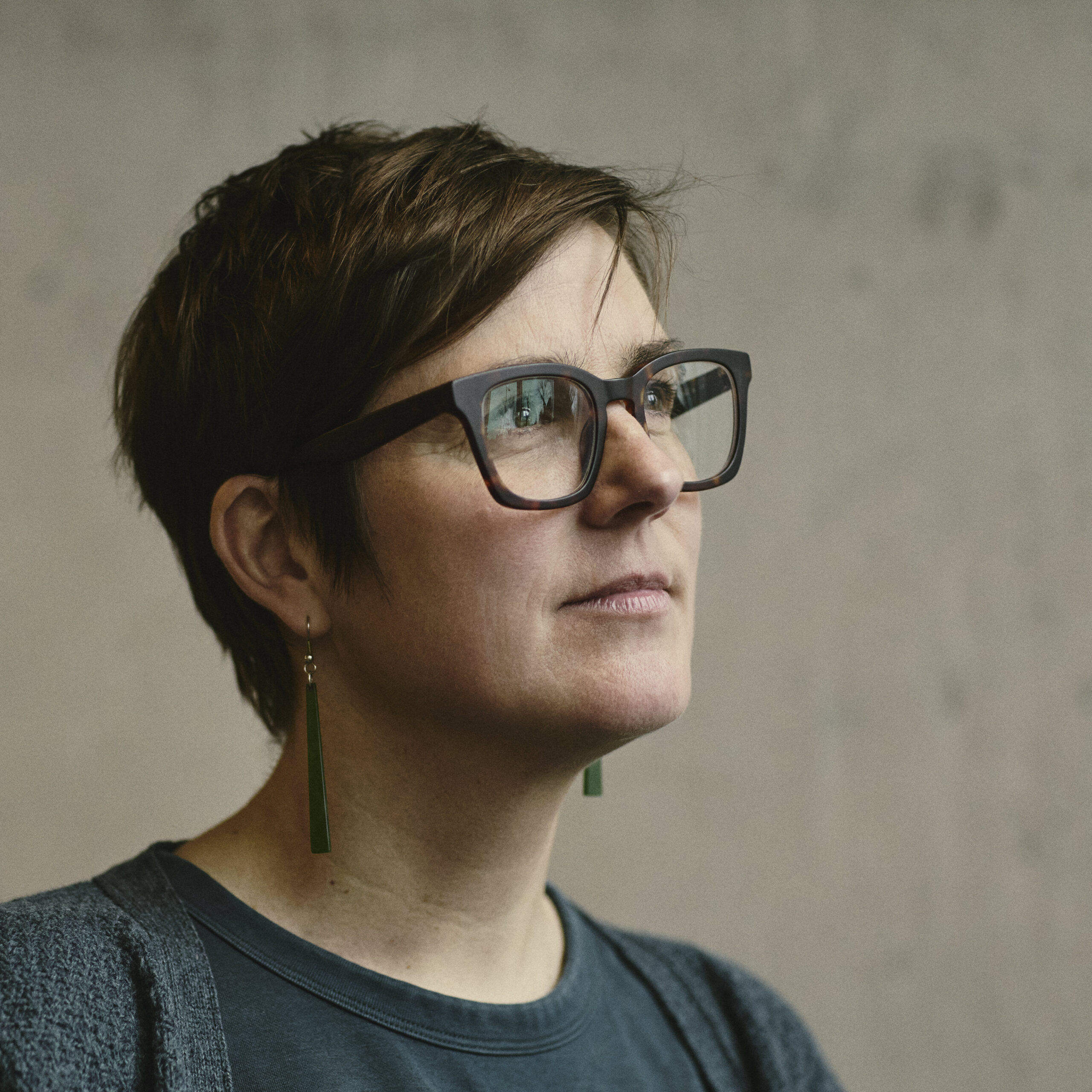 Woman looks thoughtful