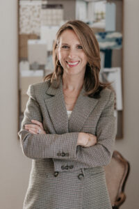 Portrait photos of a woman in a smart jacket in an interior design studio